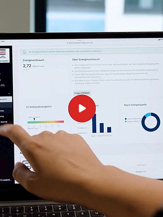 Preview image of a video: a hand operating an application on a notebook