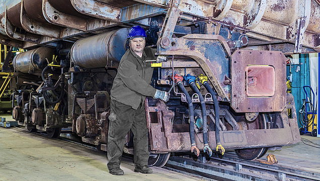 Obrázek muže pracujícího ve vlaku