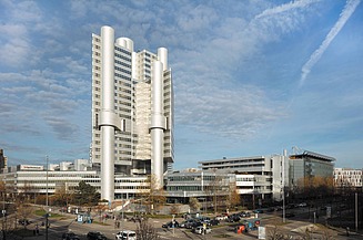 Photo of a tall building with blue sky